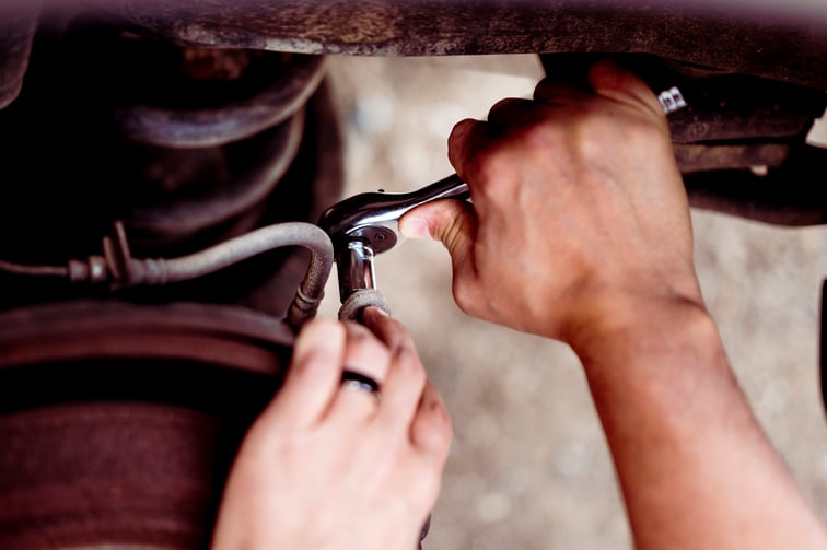 mechanic-repairing-vehicle