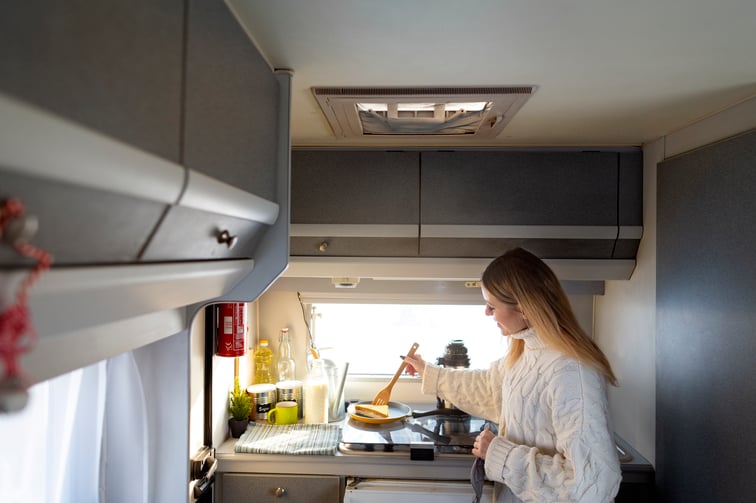 medium-shot-smiley-woman-cooking