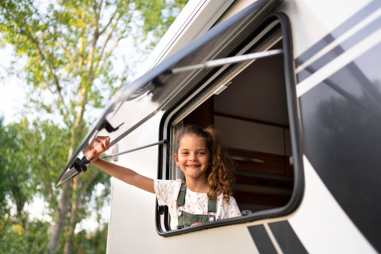 nomad-family-child-having-fun-van