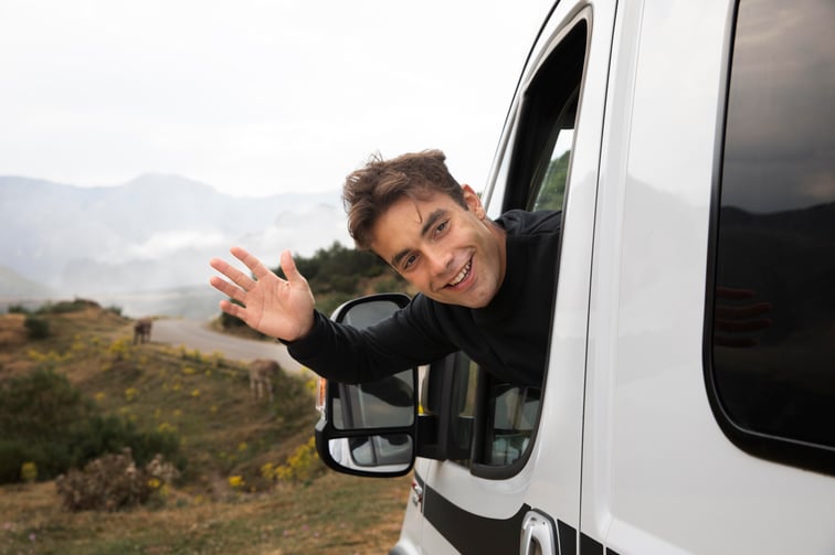 young-man-traveling-alone-van